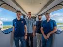 The four crew members that comprise the SpaceX Crew-6 mission pose for a photo during a training session on the crew access arm at the Kennedy Space Center's Launch Pad 39A in Florida. From left are, Mission Specialist Andrey Fedyaev, Pilot Warren "Woody" Hoburg, Mission Specialist Sultan Al Nedayi, and Commander Stephen Bowen. Photo Courtesy of SpaceX.